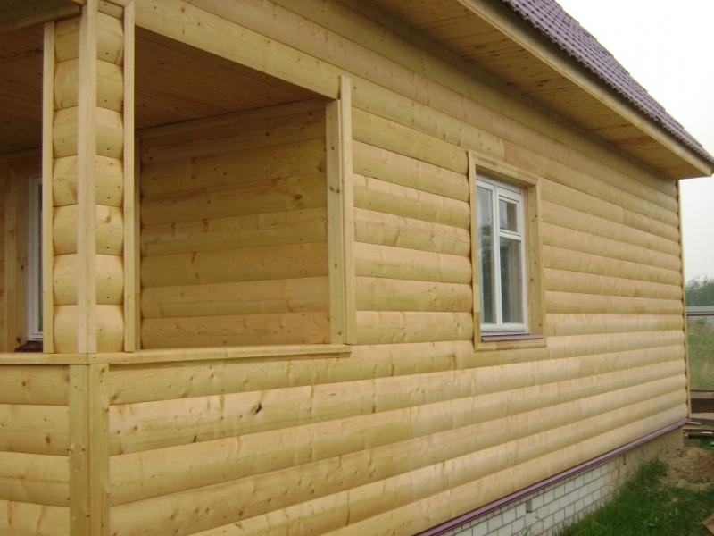 Facade decoration under a wooden frame. Block house used